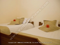 twin_bedroom_of_le_palmiste_resort_and_spa.jpg