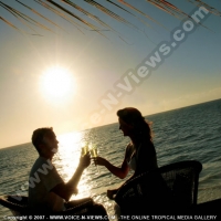pearle_beach_hotel_mauritius_couple_having_champagne_at_sunset.jpg