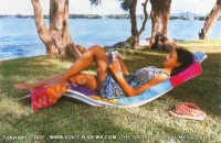 filao_village_hotel_lady_relaxing_in_sunbed.jpg