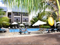 2_star_hotel_le_palmiste_hotel_mauritius_guest_reading_in_sunbed.jpg