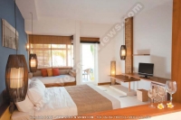 laguna_beach_hotel_and_spa_mauritius_double_bedroom_with_television.jpg