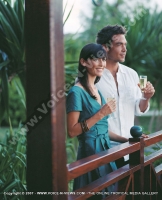 anahita_resort_mauritius_couple_taking_champagne_on_terrace_watermark_view.jpg