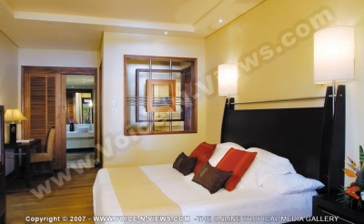paradis hotel & golf club mauritius executive villa bedroom and bathroom view
