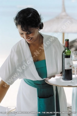 royal palm hotel mauritius waitress at the restaurant
