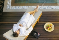 sainte_anne_resort_seychelles_guest_relaxing_in_sun_bed_at_the_spa.jpg