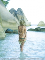 sainte_anne_resort_seychelles_lady_going_for_a_swim.jpg