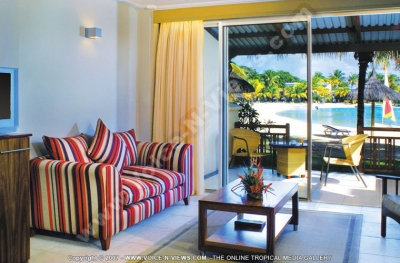 shandrani resort and spa hotel mauritius superior room terrace and living room view
