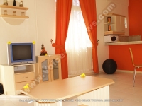 standard_apartment_pereyebere_ref_187_view_of_the_kitchen_side_and_the_tv_room.JPG